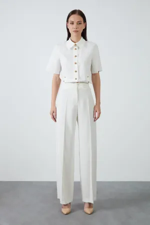 Stylish Ecru Trousers with Loose Leg